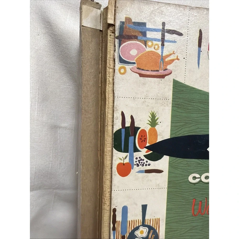 Cutco wood utensil block and 1956 Cutco Cookbook